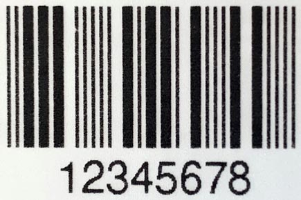 Gut erkennbar in der Vergrößerung: Die Rasterung des Druckbildes am Beispiel eines Barcode-Etiketts